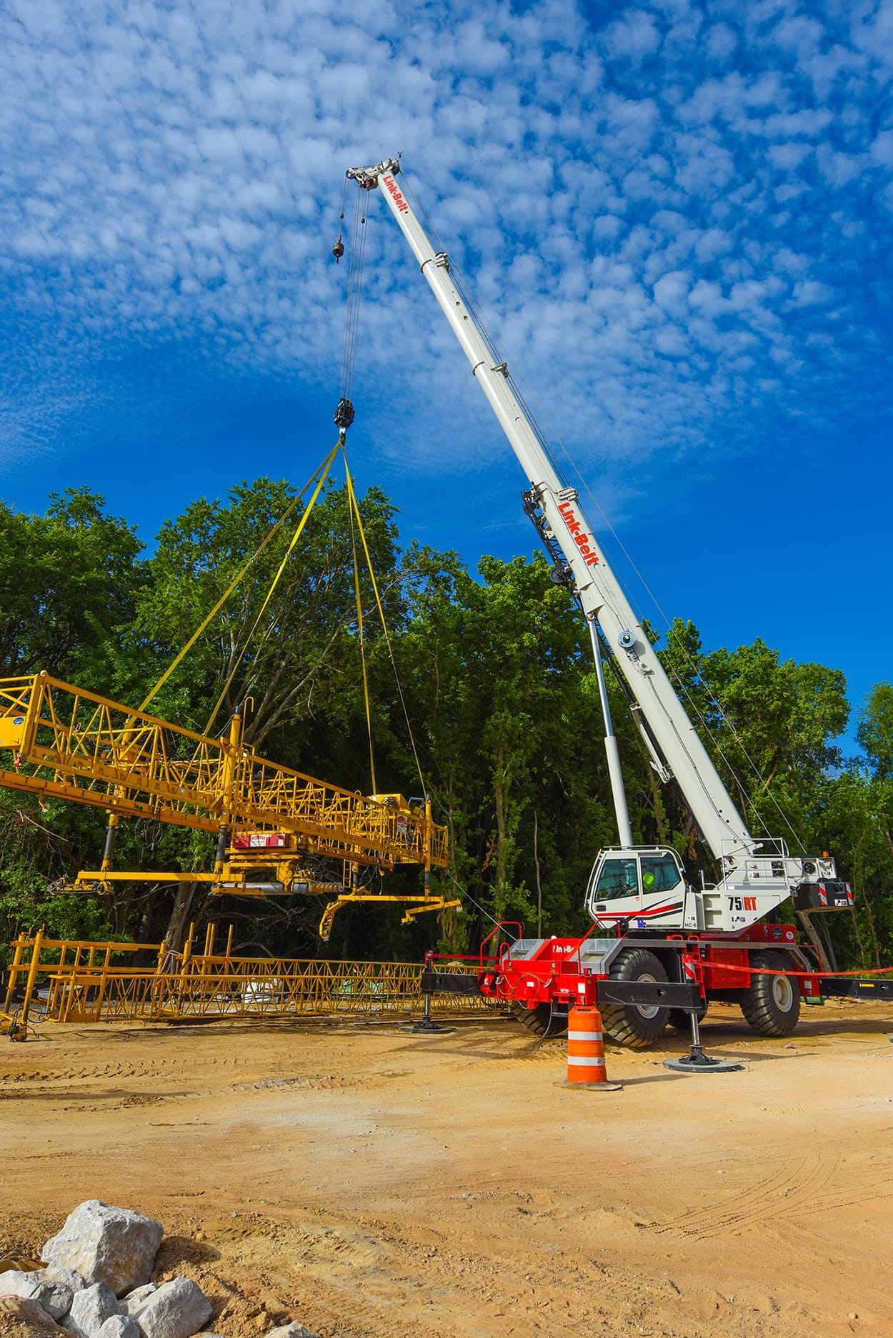 Link-Belt rough terrain crane rigging a load on an open jobsite