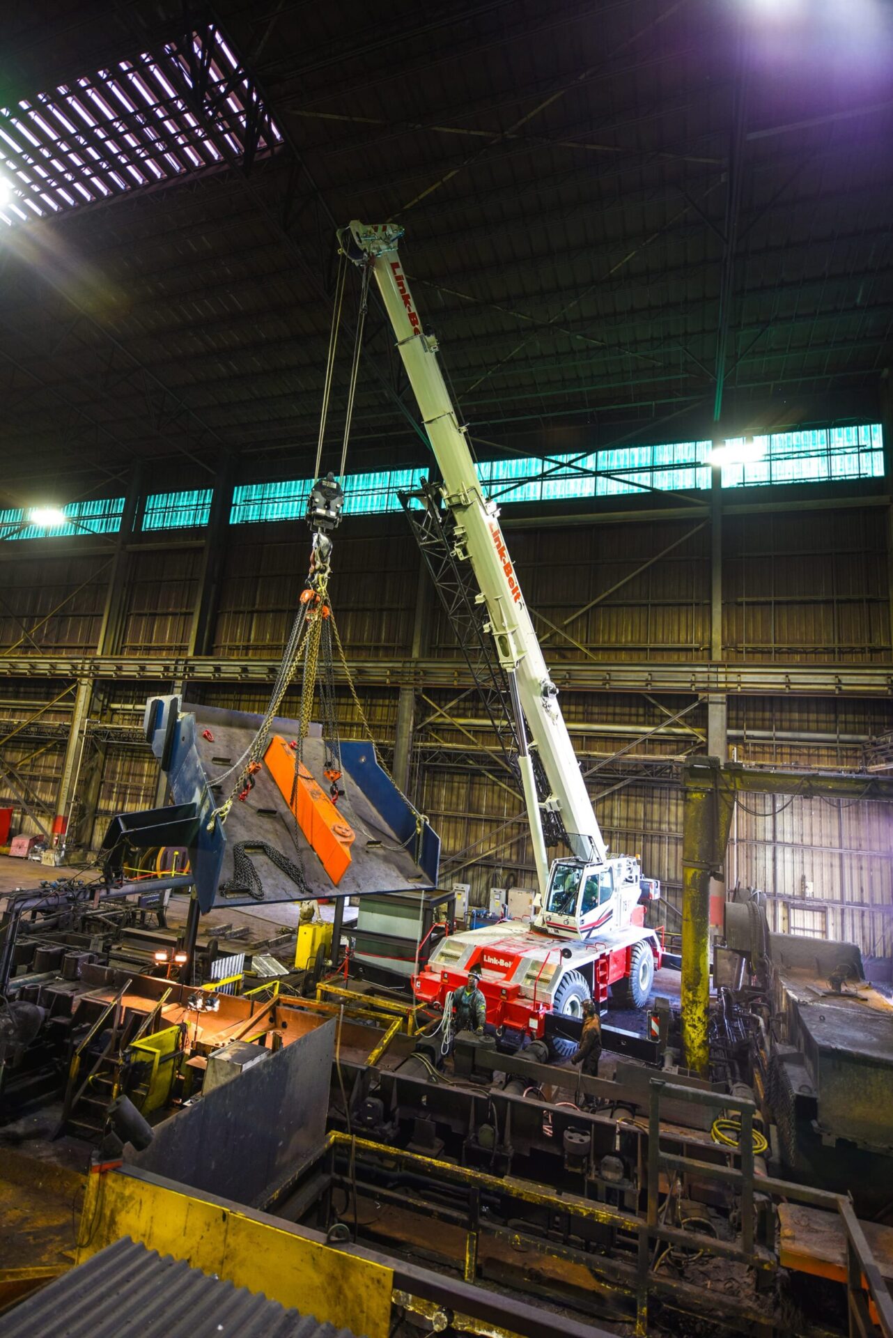 Link-Belt rough terrain crane lifting inside an industrial plant